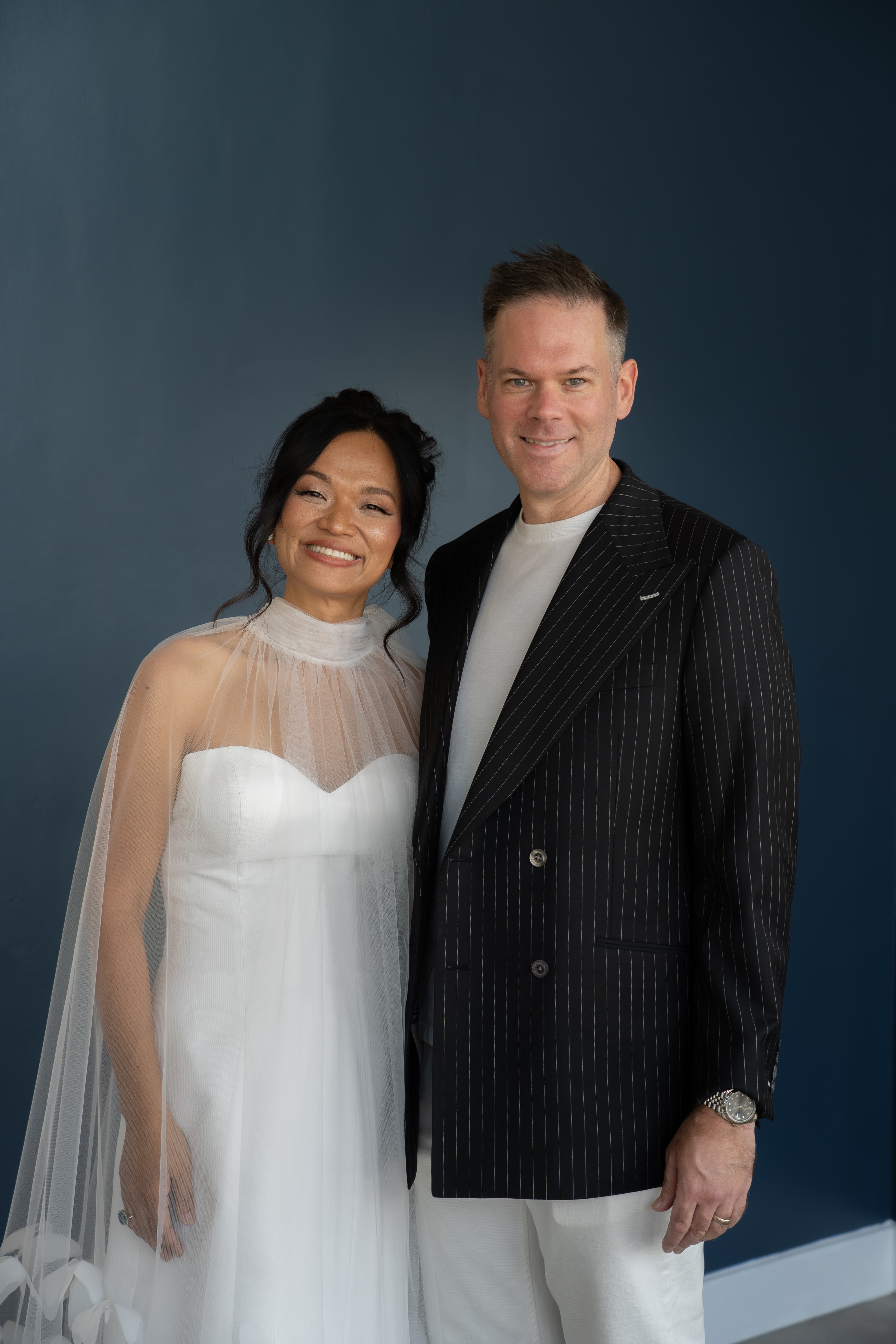 Bride in a made-to-order wedding gown by Lily and Lace Bride, Dallas