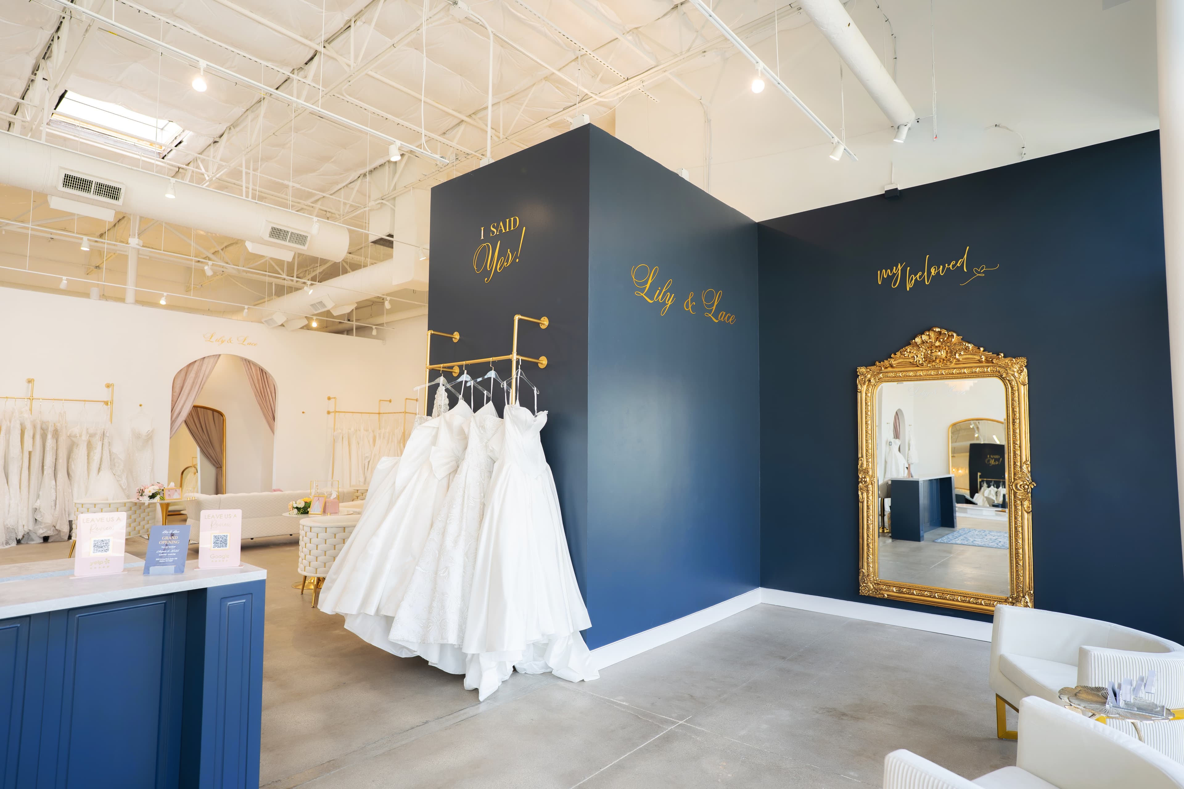 Bride trying on gowns in the Lily and Lace Bride showroom